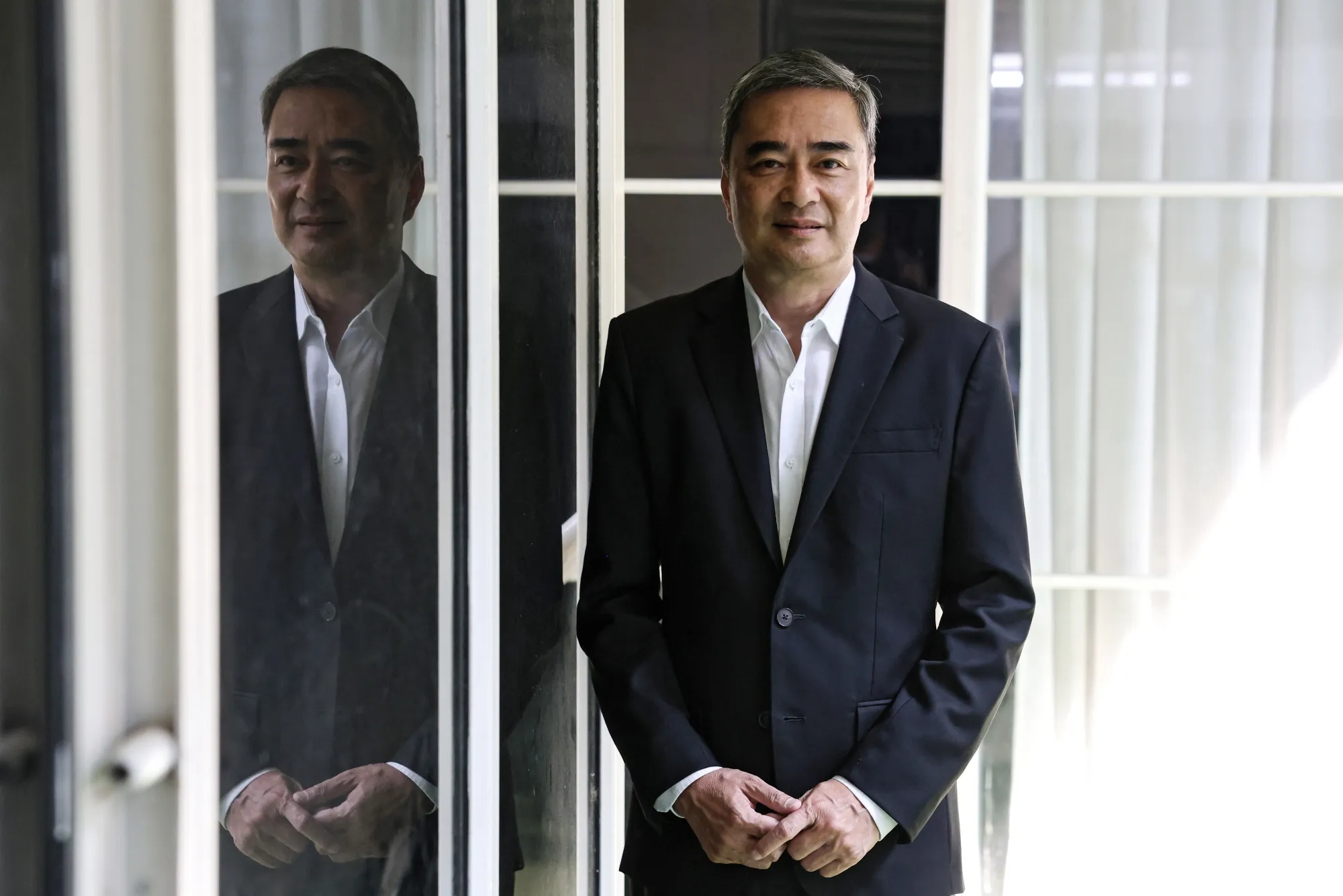 Thai Ex-Premier Abhisit Seeks Return as Anti-Scammer Kingmaker - Bloomberg