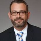 Headshot of Myke Hawkins