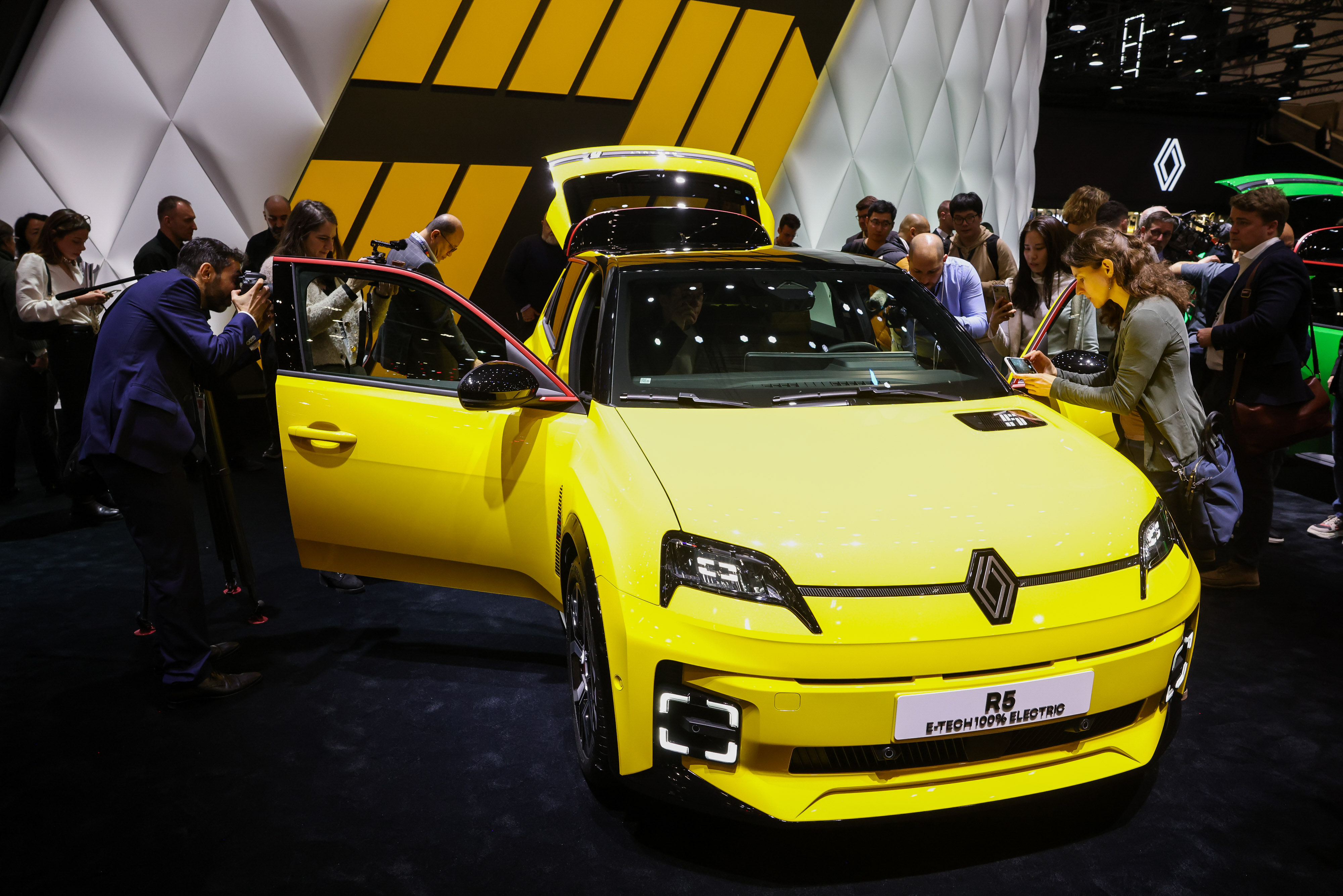 A Renault R5 E-Tech is unveiled during the Geneva Motor Show on Feb. 26.