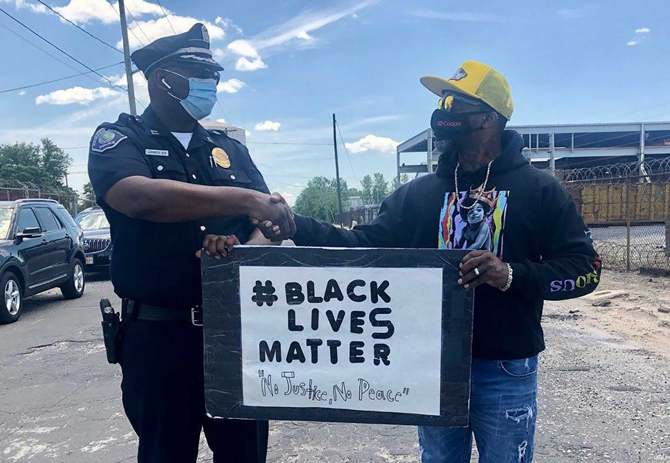 Capt. Zsakhiem James joining a group of Camden residents who came together to honor George Floyd and protest his death.