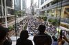 Demonstrators march along Queensway, Hong Kong on Aug. 18.
