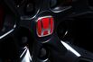 A Honda Motor Co. badge.