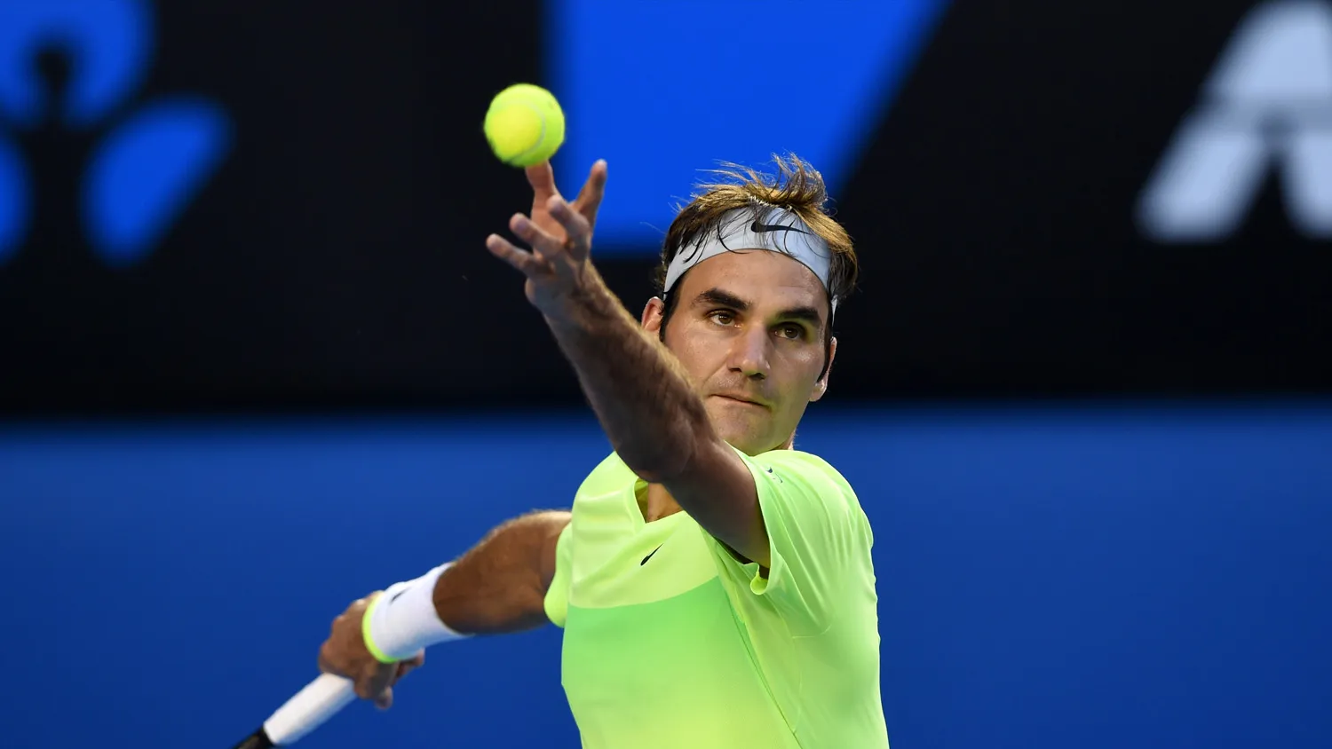 Roger Federer serves during his men's singles match against Taiwan's Lu Yen-Hsun on day one of the 2015 Australian Open tennis tournament in Melbourne on Jan. 19.
