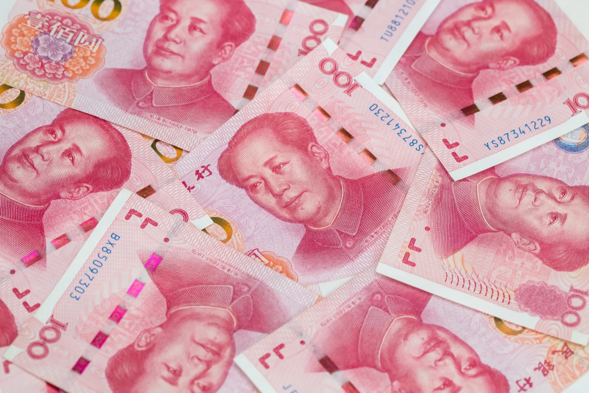 Hong Kong Dollar, Chinese Yuan and US Dollar Banknotes As Currency Peg Intervention From HKMA Continues Into Third Day