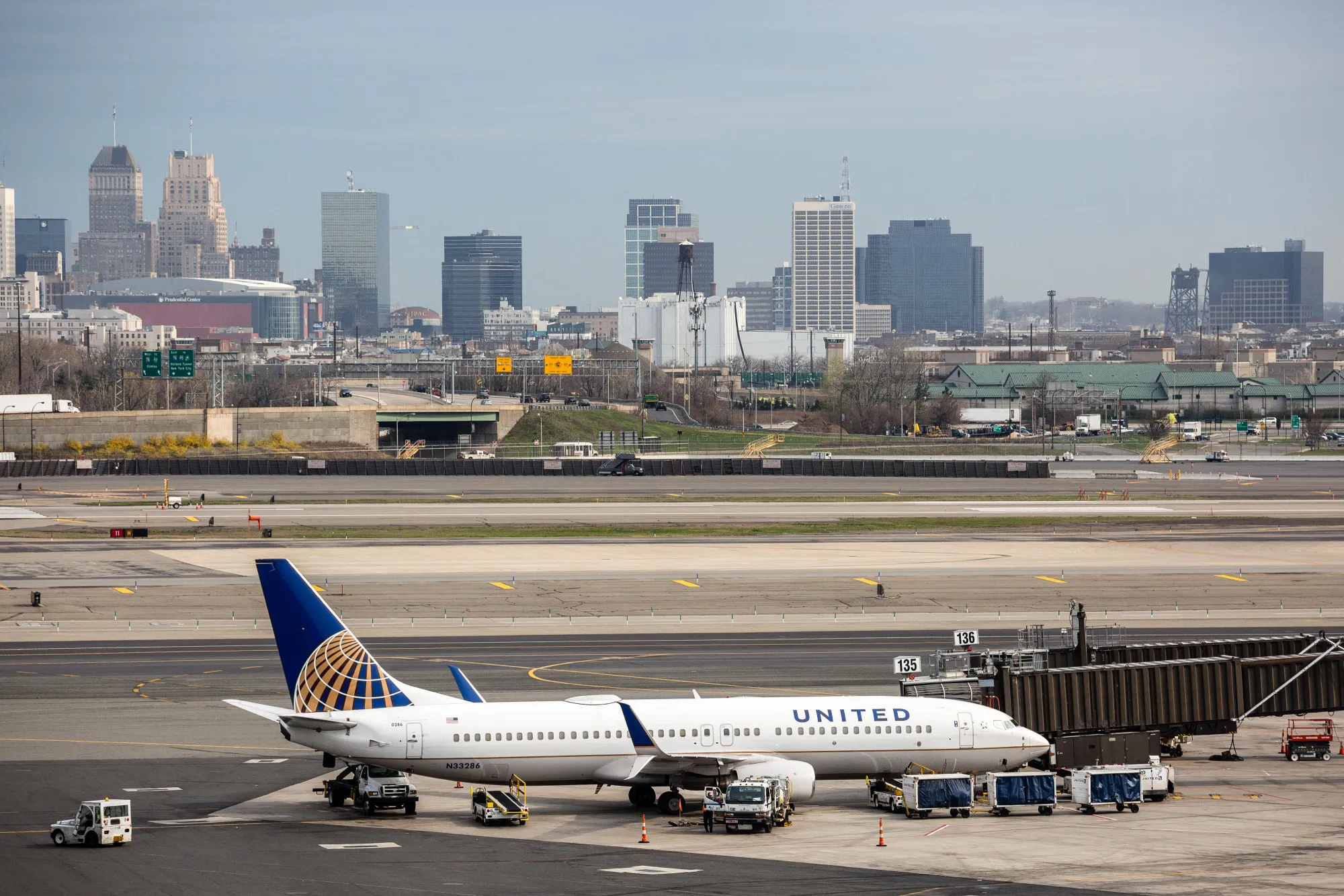 A United Continental Holdings Inc. airplane sits outside the company's terminal at Newark Liberty International Airport.