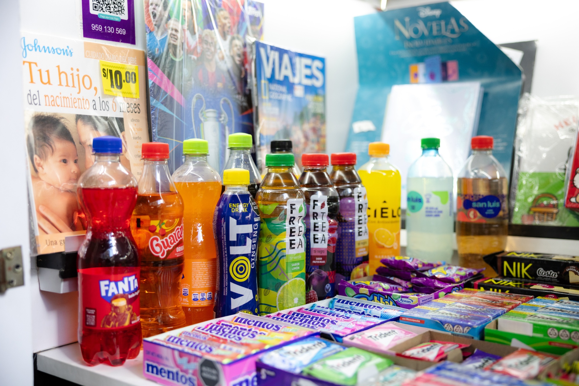 Bottles of Volt, Free Tea and Cielo drinks produced by AJE Group displayed for sale at a kiosk in Lima. Photographer: Manuel Orbegozo/Bloomberg