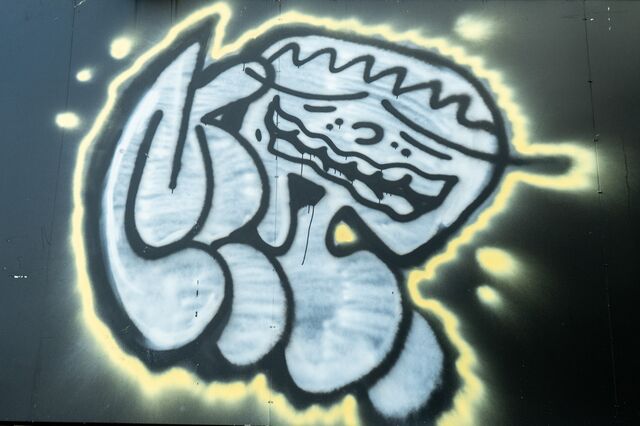 Crown-headed representation of the virus at 226 West 125th Street, Harlem
