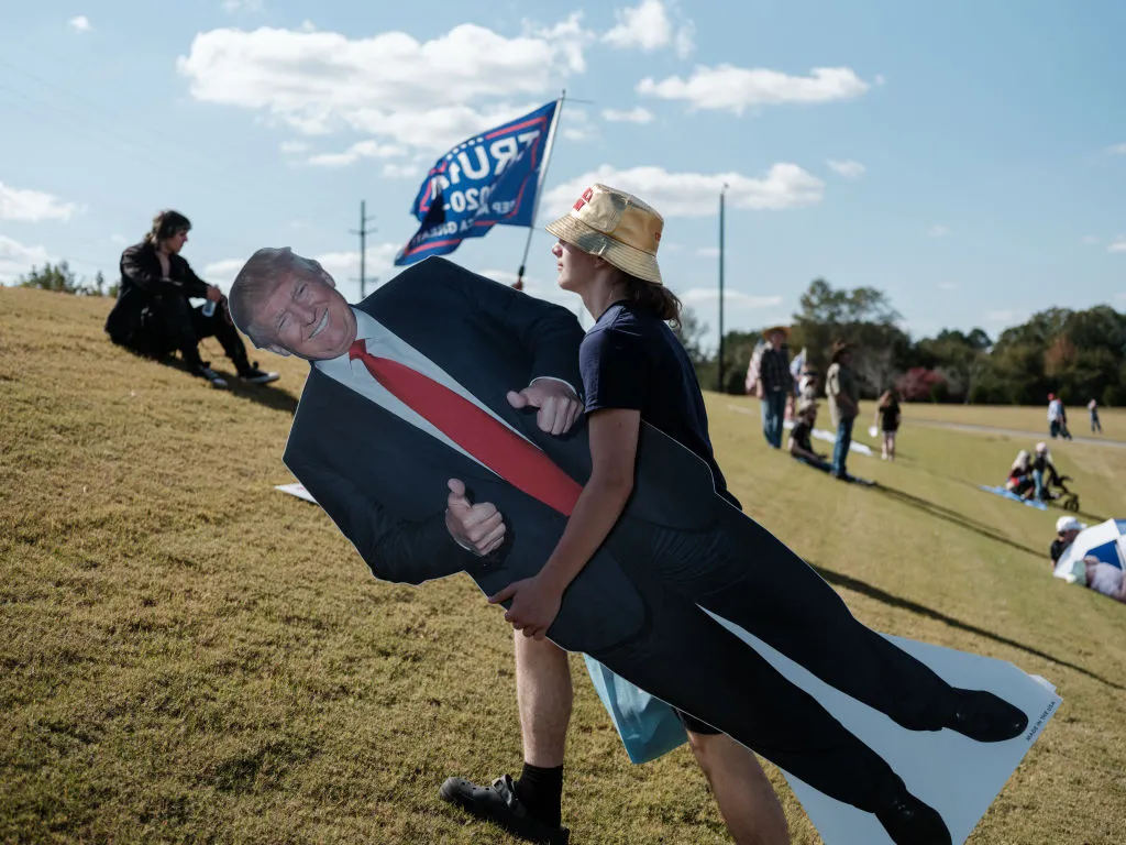 A supporter at a campaign rally outside Christ Chapel in Zebulon, Georgia.