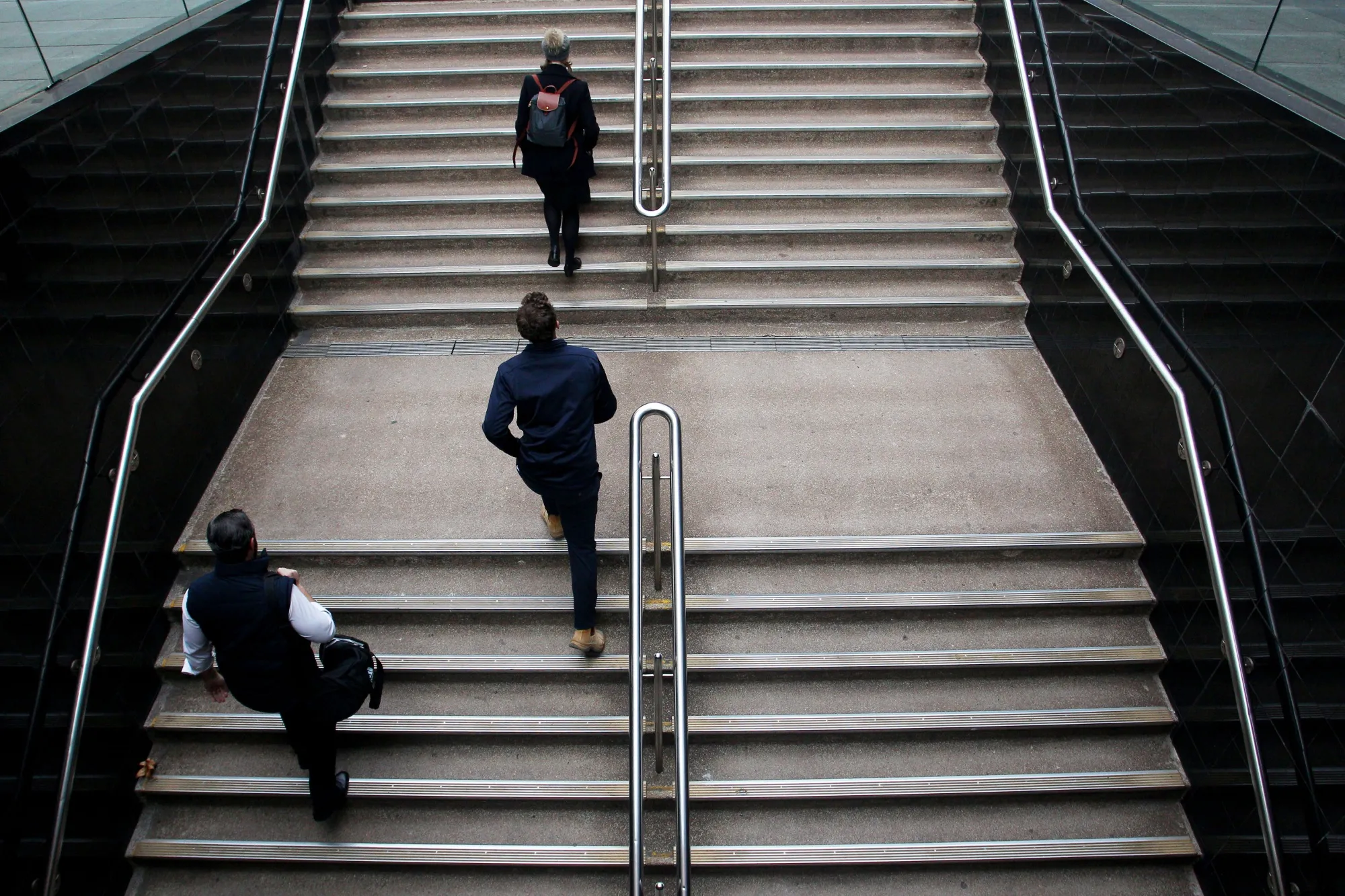 City Life Resumes as Australian Treasurer Says Economy is Moving in the Right Direction