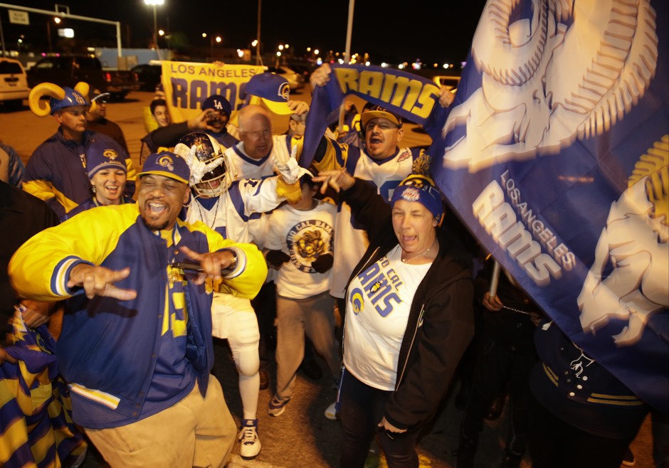 Future fans of the L.A. Rams celebrate at the site of the future stadium in Inglewood this week.