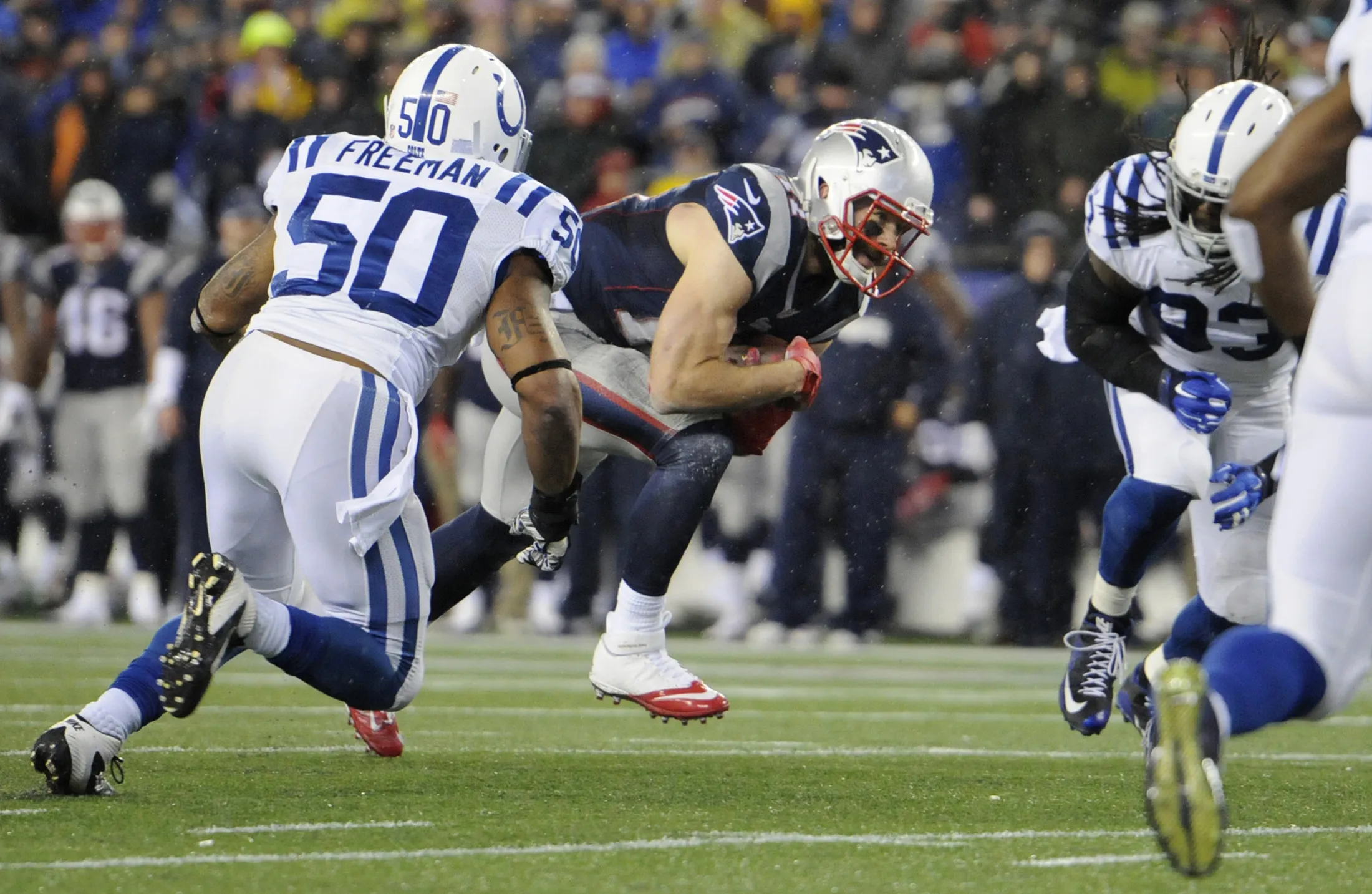 New England Patriots fullback James Develin (46) scores the second touchdown for New England during the first half on Jan. 18, 2015, at Gillette Stadium in Foxborough, Mass.
