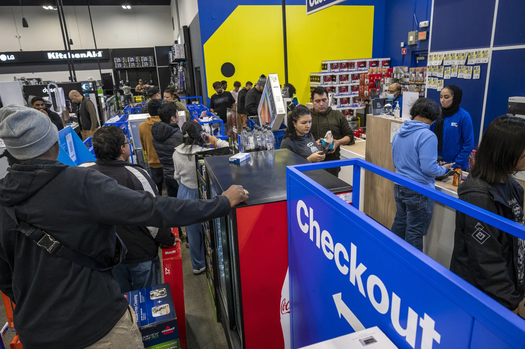 Shoppers wait to check out out a Best Buy store in Union City, California, during this year’s Black Friday.