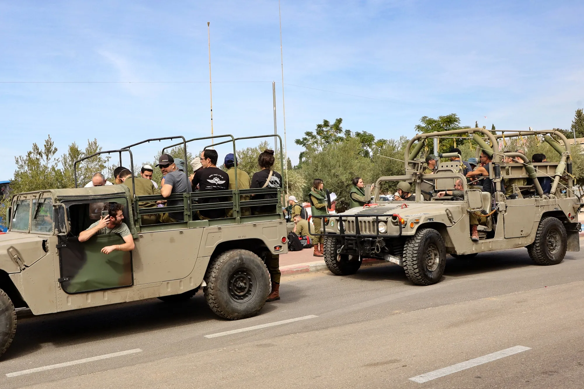 Israeli reservists are transported to a military base near Tel Aviv on Oct. 7.