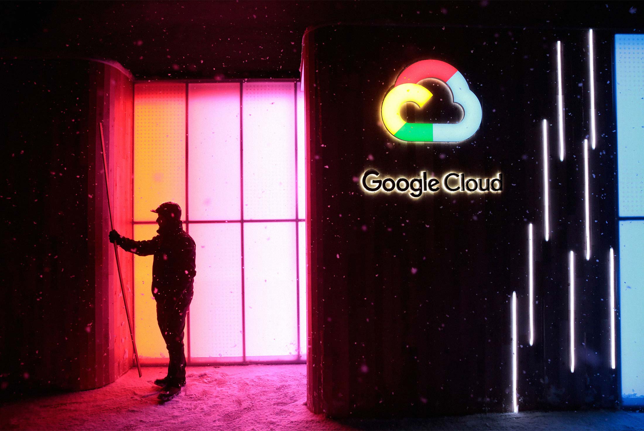 A worker stands by a Google Inc. 'Google Cloud' pop-up space in Davos, Switzerland, on Sunday, Jan. 21, 2018.