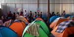 Tents are piled up in a hangar at Juventud 2000 migrant shelter in Tijuana, Baja California state, Mexico on July 13, 2019.