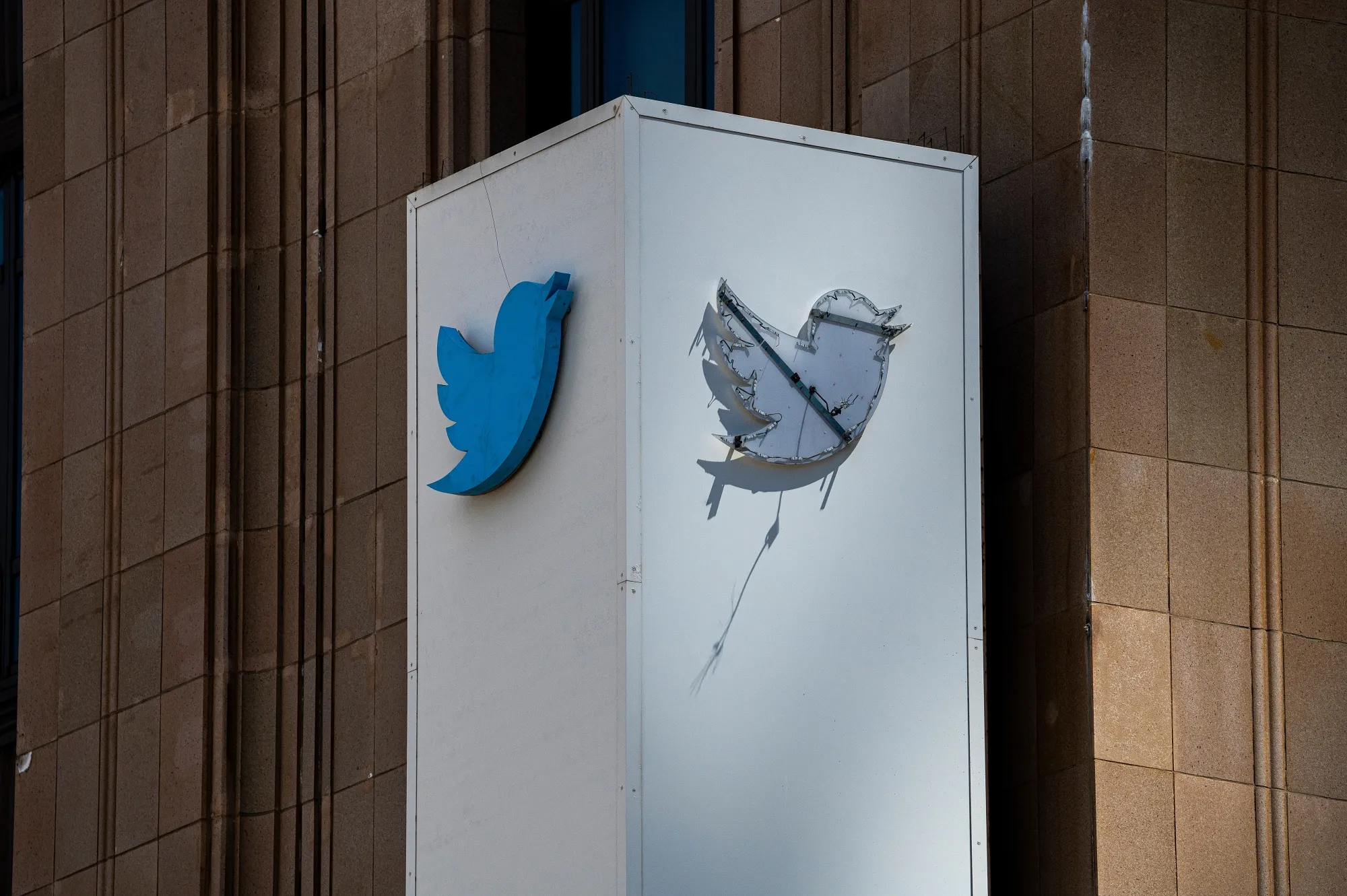 A partially removed sign at Twitter headquarters in San Francisco.