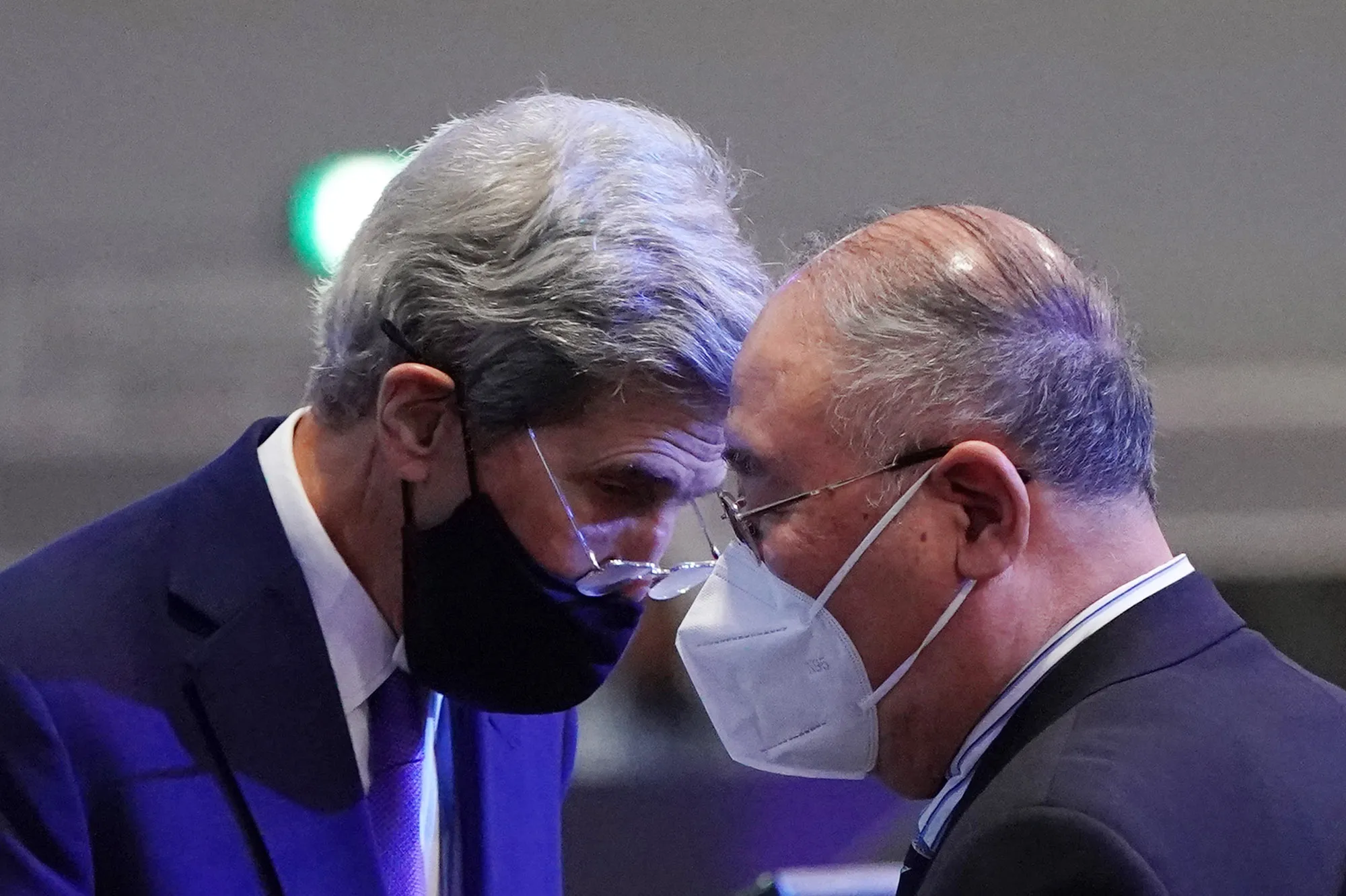 GLASGOW, SCOTLAND - NOVEMBER 13: U.S. Special Presidential Envoy for Climate John Kerry speaks with Special Climate Envoy of China Xie Zhenhua.