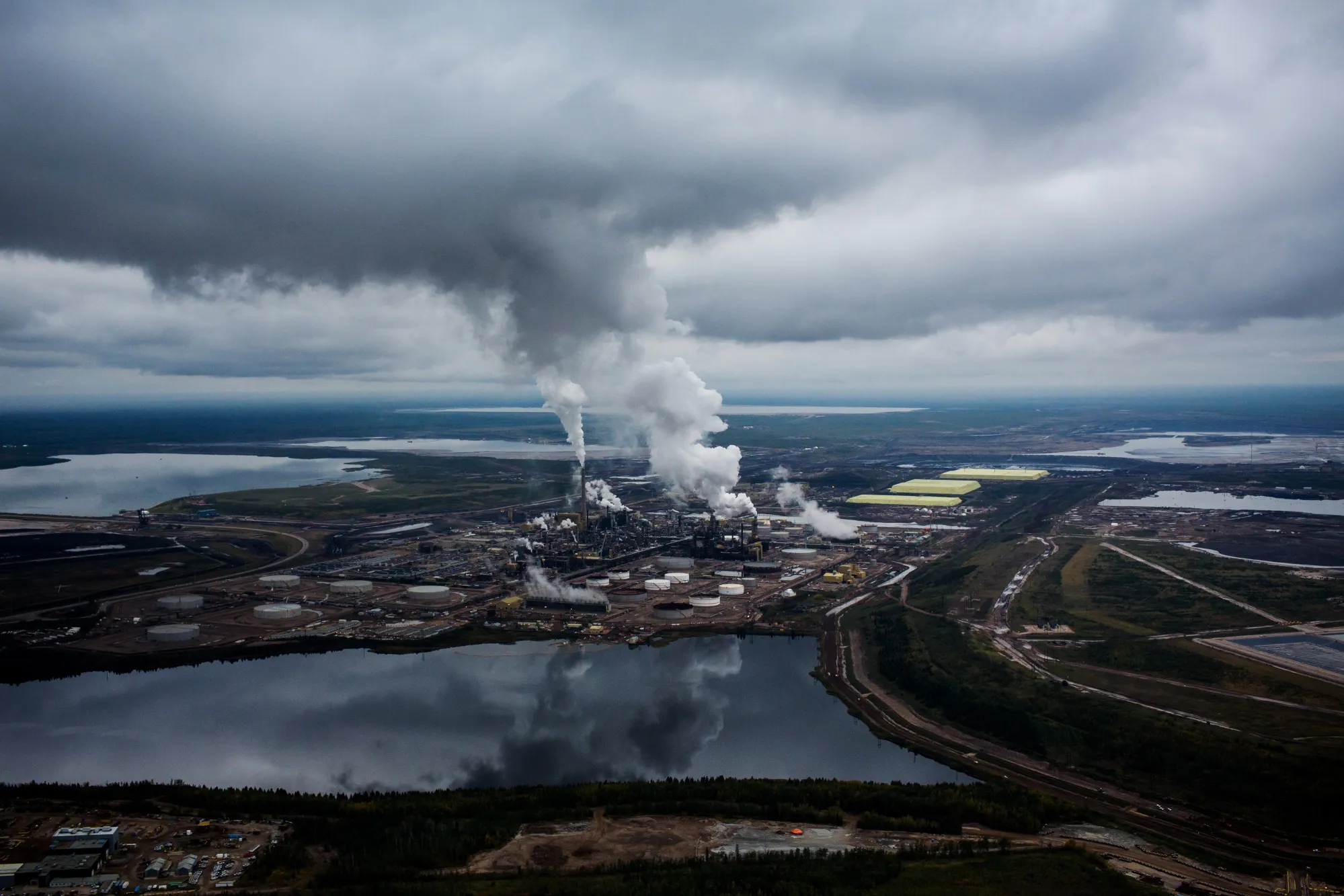Steam rises from the Syncrude Canada Ltd. upgrader plant in Alberta, Canada.