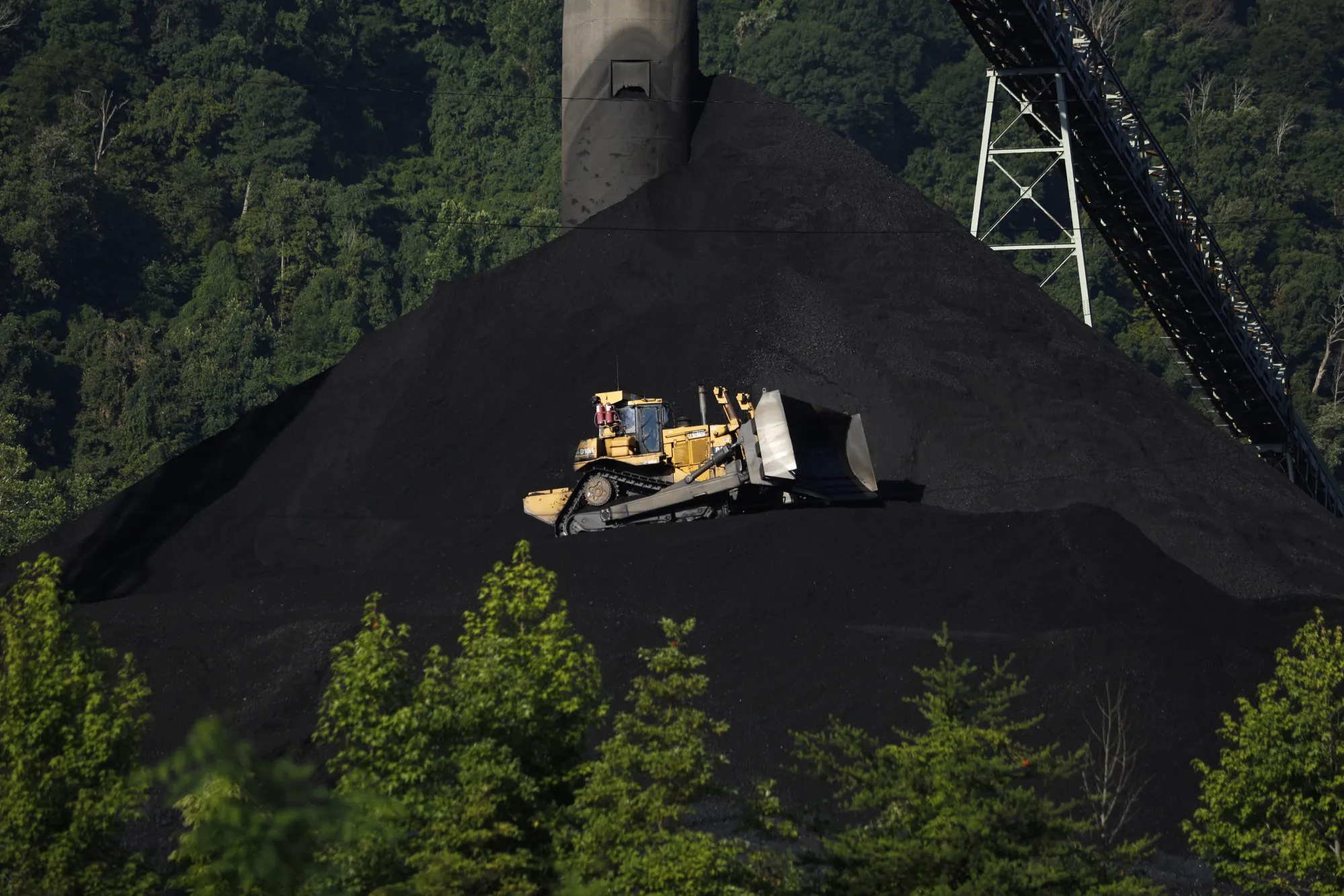 A&nbsp;bulldozer operates on a coal mound at a coal preparation plant in London, West Virginia.