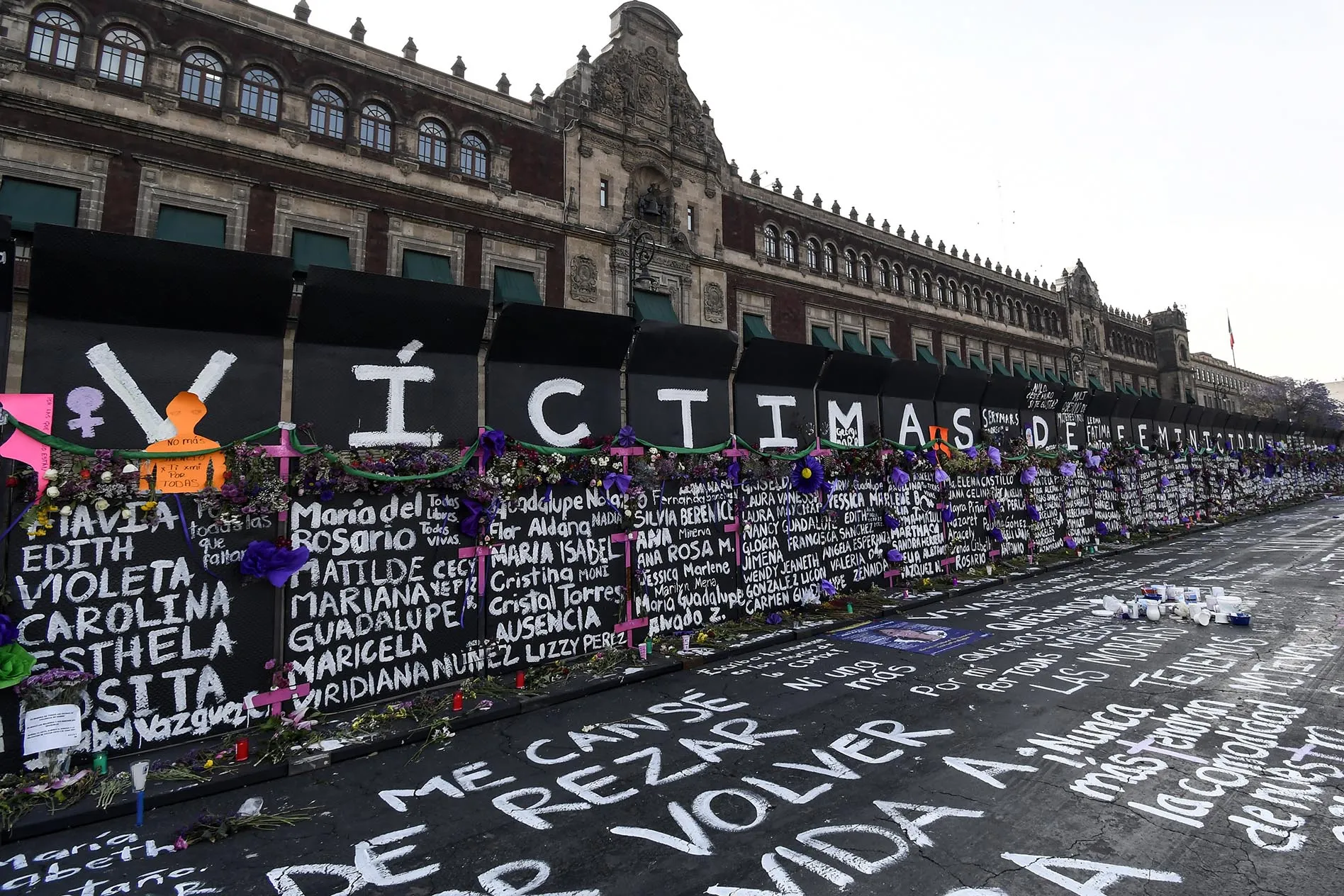 Names of feminicide victims, slogans and flowers on a barricade outside the National Palace ahead of International Women’s Day demostrations on March 8.