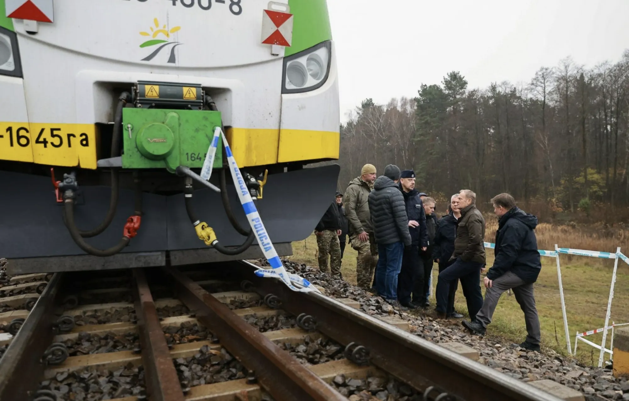 Donald Tusk visits the site of an explosion on a railway route in eastern Poland, in a photo released on Nov. 17.
