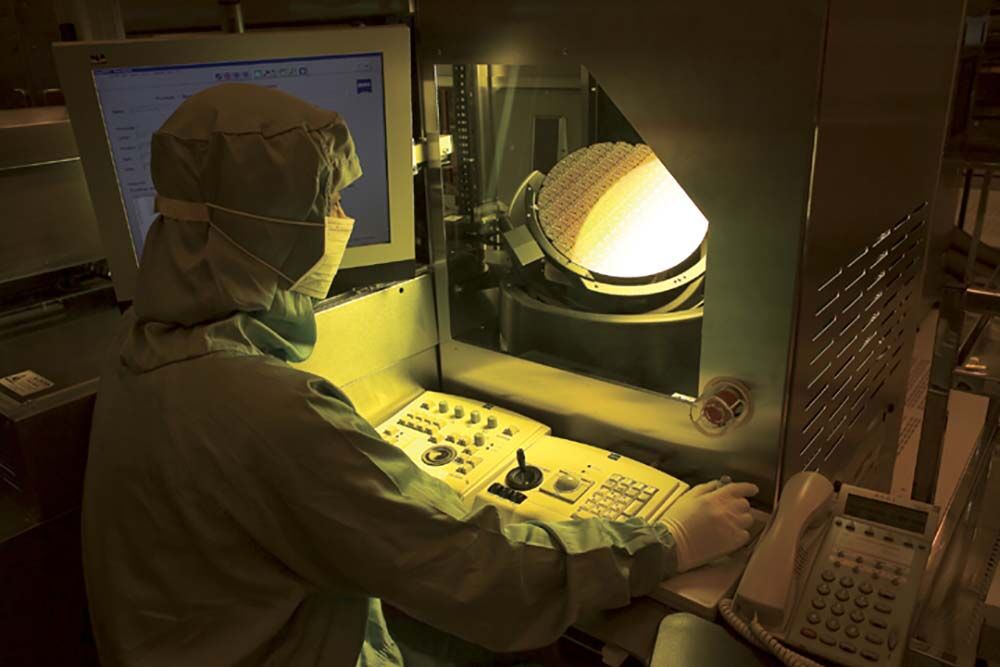 Twelve inch silicon wafers being manufactured at a TSMC facility in Taiwan.