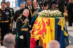 King Charles III walks near the coffin of Queen Elizabeth II inside St. Giles Cathedral in Edinburgh on Sept. 12.