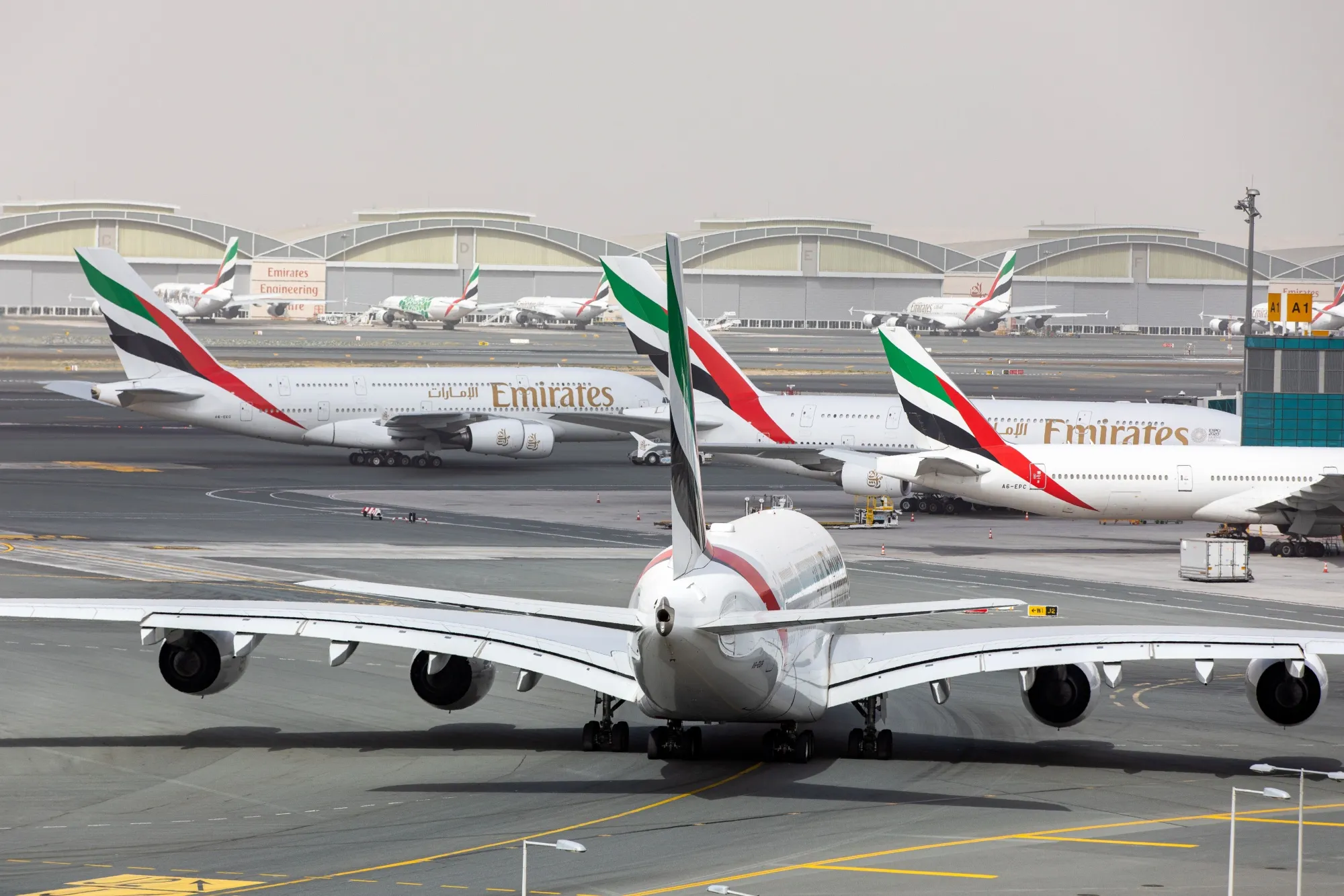 An Airbus SE A380-800 aircraft, operated by Emirates, taxis at Dubai International Airport in Dubai, United Arab Emirates.