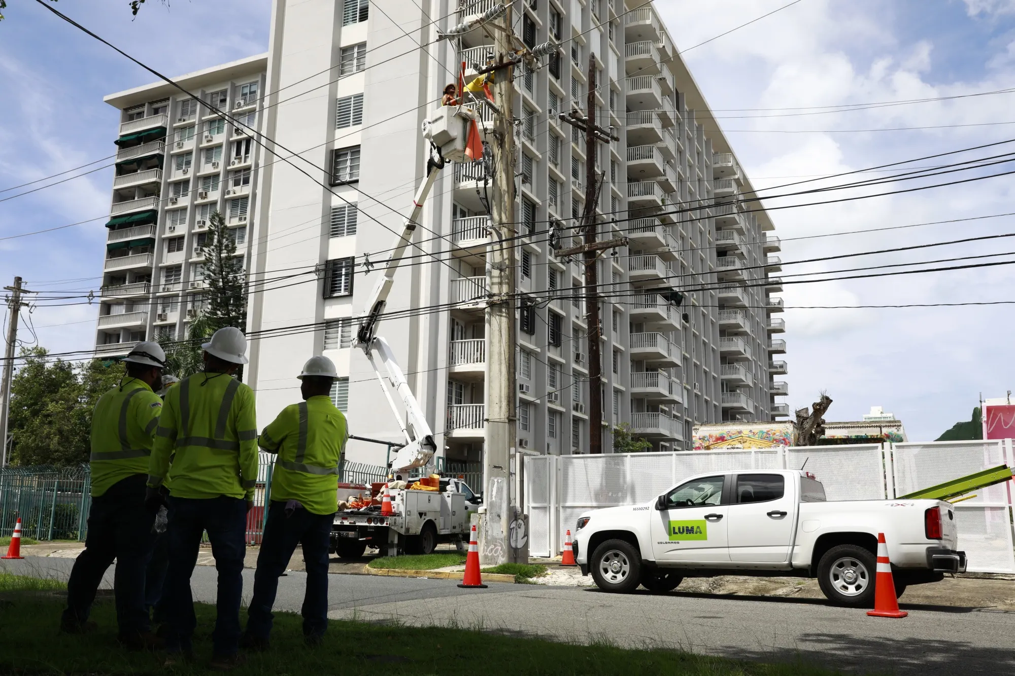 Luma Energy workers fix utility poles following&nbsp;Hurricane Fiona in San Juan, on Sept. 20.&nbsp; &nbsp;