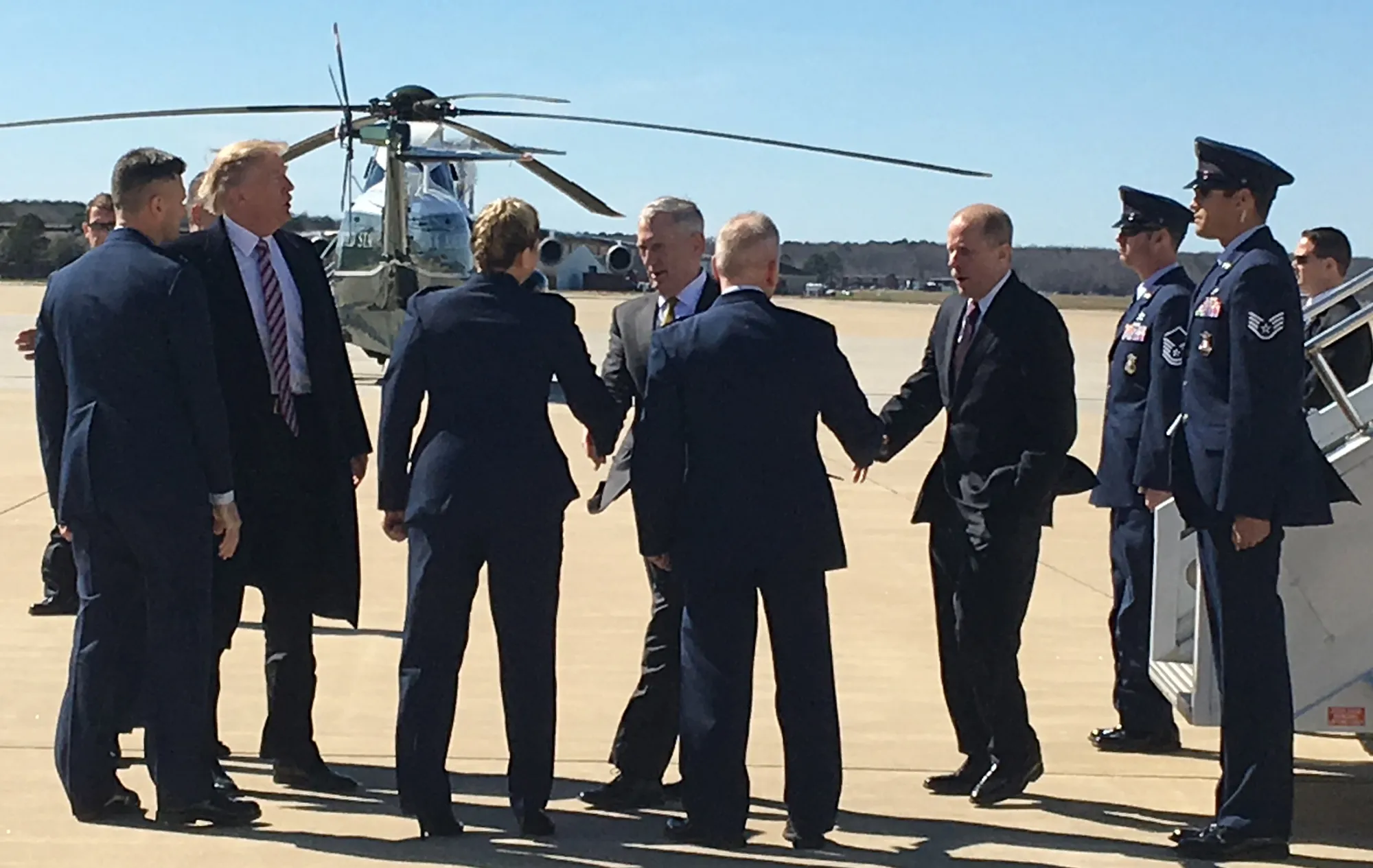 Stephen Feinberg, right, with Secretary James Mattis and President Donald Trump after departing Air Force One at Langley Air Force Base on March 2, 2017.
