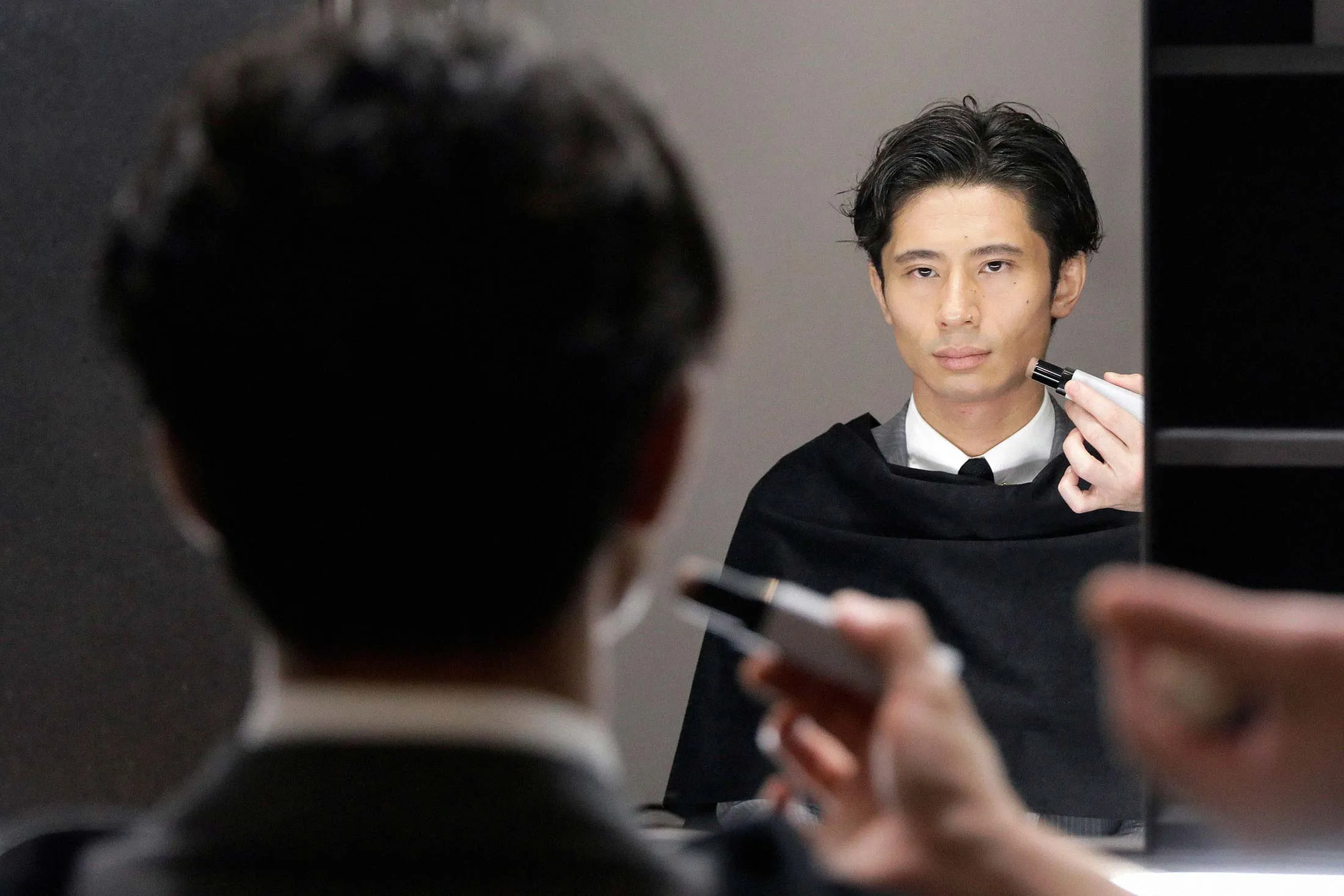 A demonstration of the Fiveism line at a shop in Tokyo.