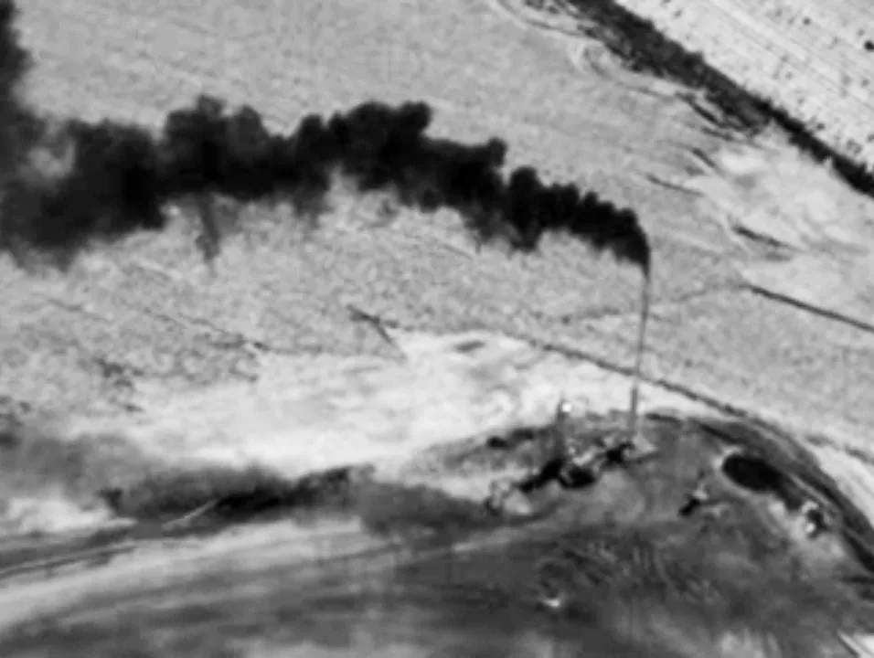 An infrared photograph shows emissions from an unlit gas flare.