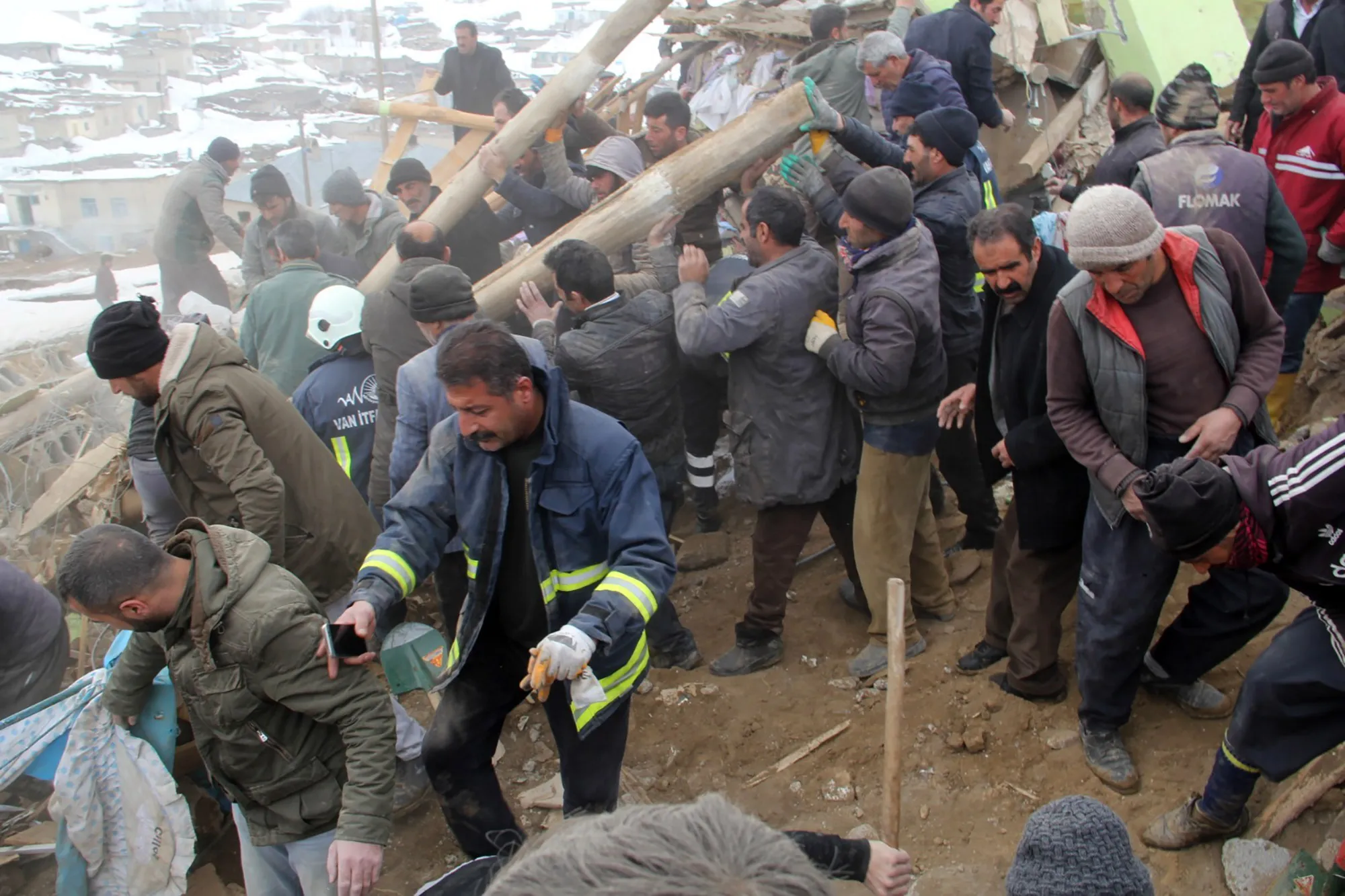 Teams remove collapsed mud-brick materials in Van province, Turkey,&nbsp;on Feb.&nbsp;23.&nbsp;