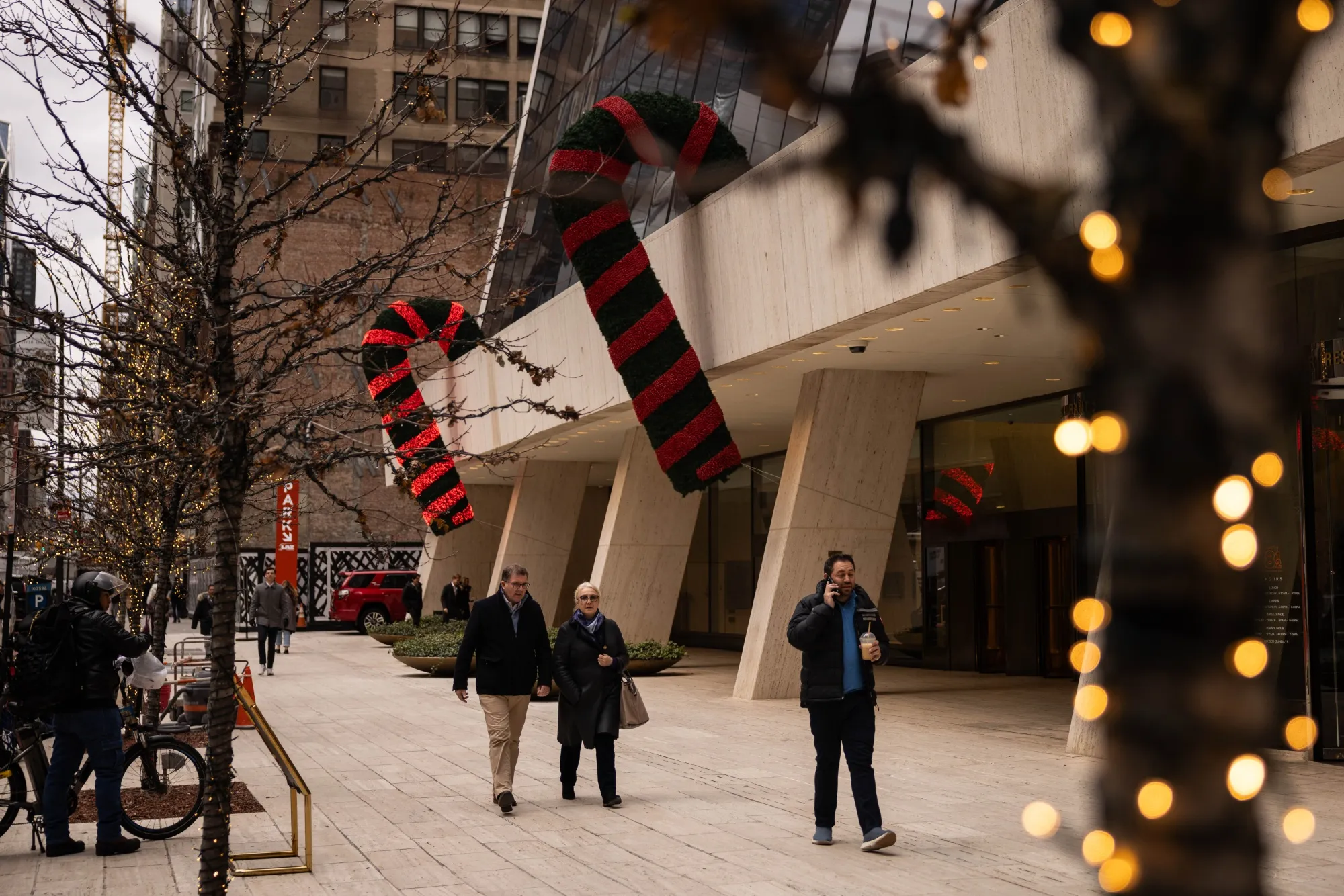 Pedestrians in Midtown Manhattan as a year of economic nuance draws to a close.