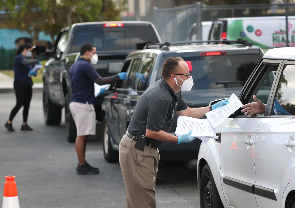 A drive-though unemployment line.
