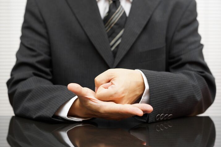 RF Royalty-free - angry businessman   making a fist on meeting