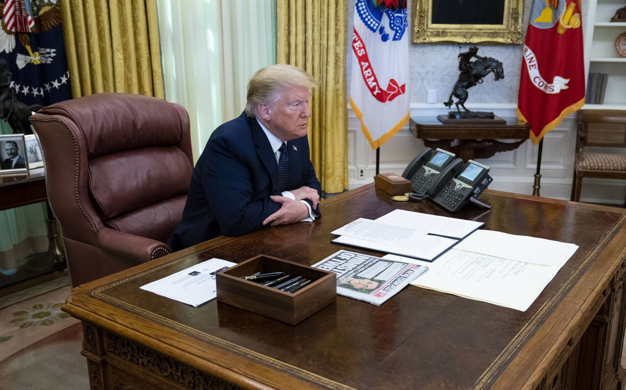 U.S. President Donald Trump sits before signing an executive order in Washington, D.C., U.S., on Thursday, May 28, 2020.