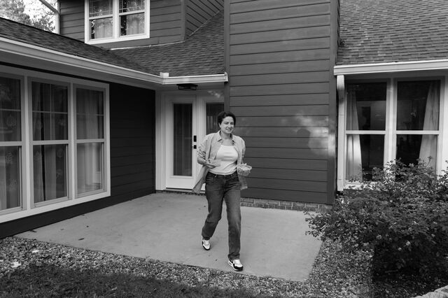 Kosareva walks out of her home to her backyard. 