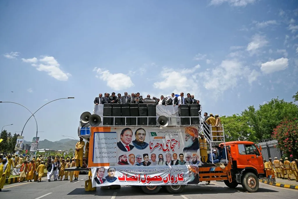 Supporters of Pakistan's ruling alliance gather near the Supreme Court in Islamabad, on May 15.&nbsp;