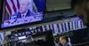 NEW YORK, NY - MARCH 1: Traders work on the floor of the New York Stock Exchange (NYSE) as U.S. President Donald Trump is seen on TV on March 1, 2018.