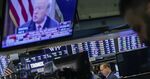 NEW YORK, NY - MARCH 1: Traders work on the floor of the New York Stock Exchange (NYSE) as U.S. President Donald Trump is seen on TV on March 1, 2018.