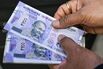 Rupee Set to Extend Slump to Record Lows on India Rate-Cut Bets