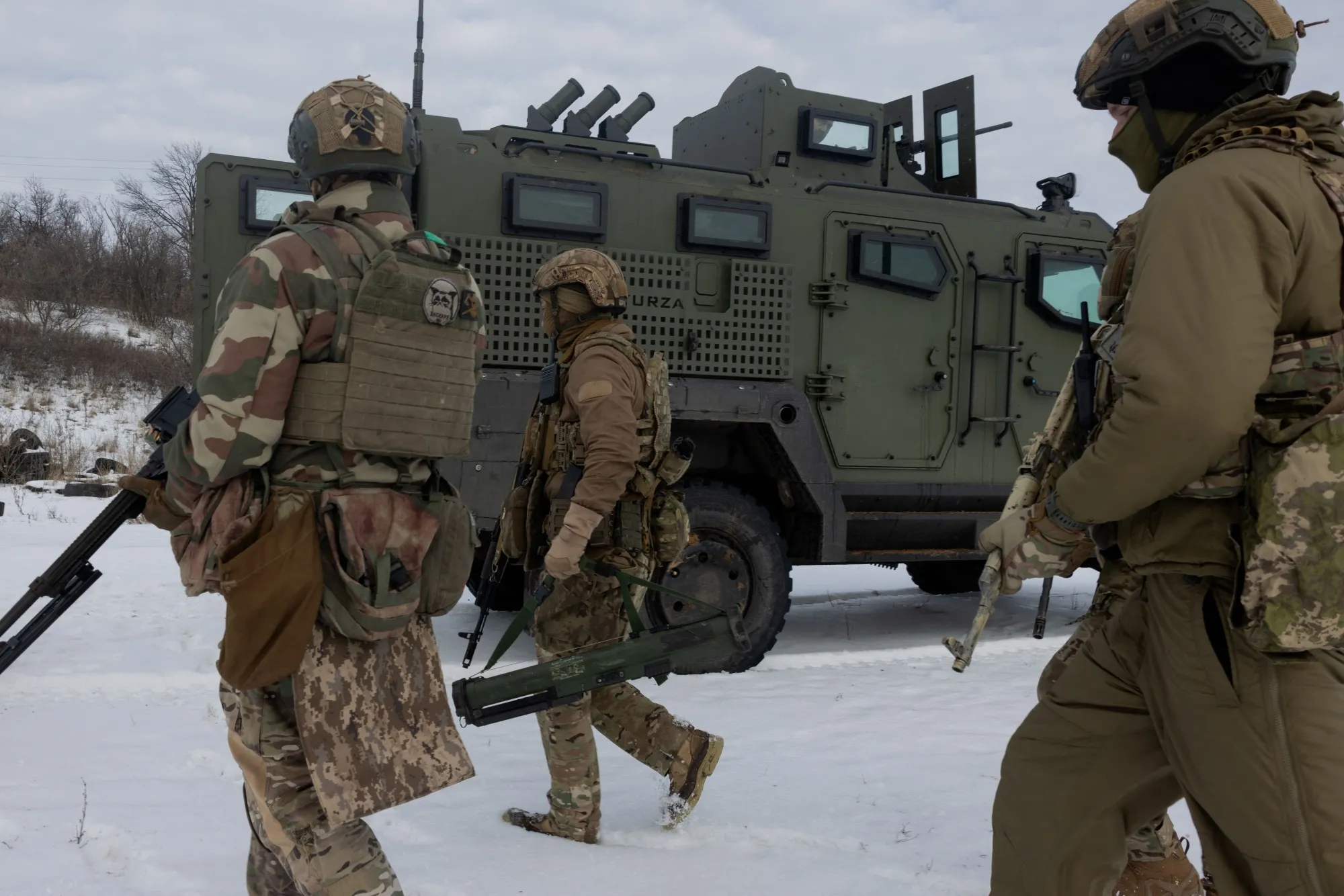 Ukrainian servicemen use military equipment during training at an undisclosed location on Jan. 28.