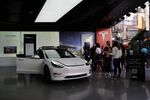 A Tesla store on Black Friday at the Westfield Century City shopping mall in Los Angeles, California, U.S., on Friday, Nov. 26, 2021. Consumers are finding some of the least-generous Black Friday and Cyber Week deals on record because of inflation, robust demand and diminished product availability.