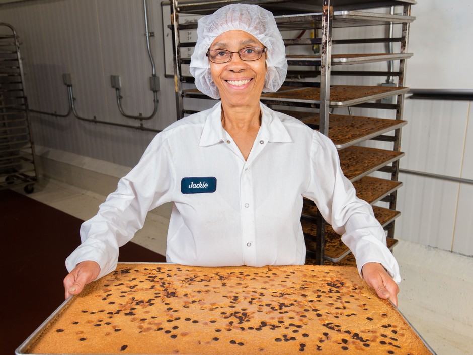 Miss Jackie holds a tray of Snickerdoodle Blondies at Greyston Bakery