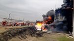 Firefighters work at the site of fire at an oil depot in Belgorod region, Russia, on April 1. Source: