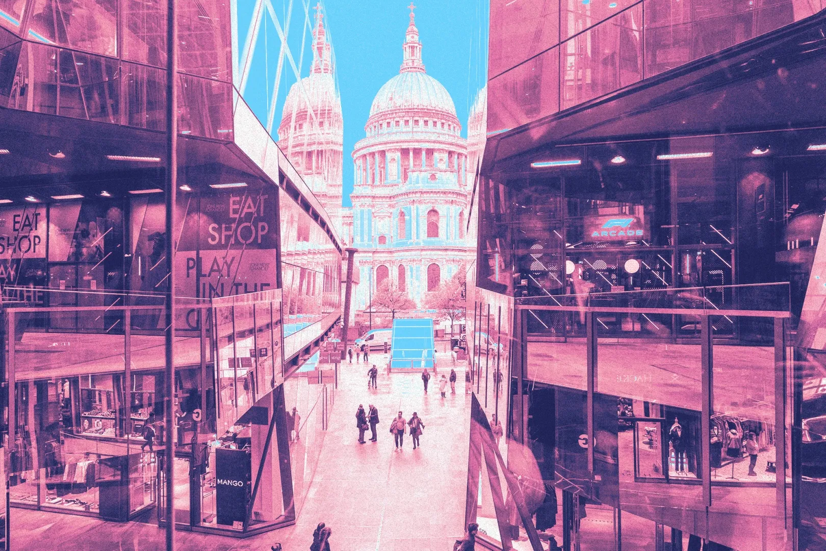 Pedestrians in a shopping centre in the City of London on Monday, Oct. 28.