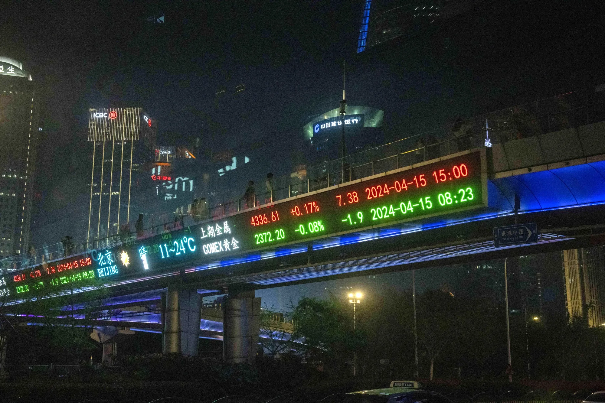 Stock figures in Pudong's Lujiazui Financial District in Shanghai.