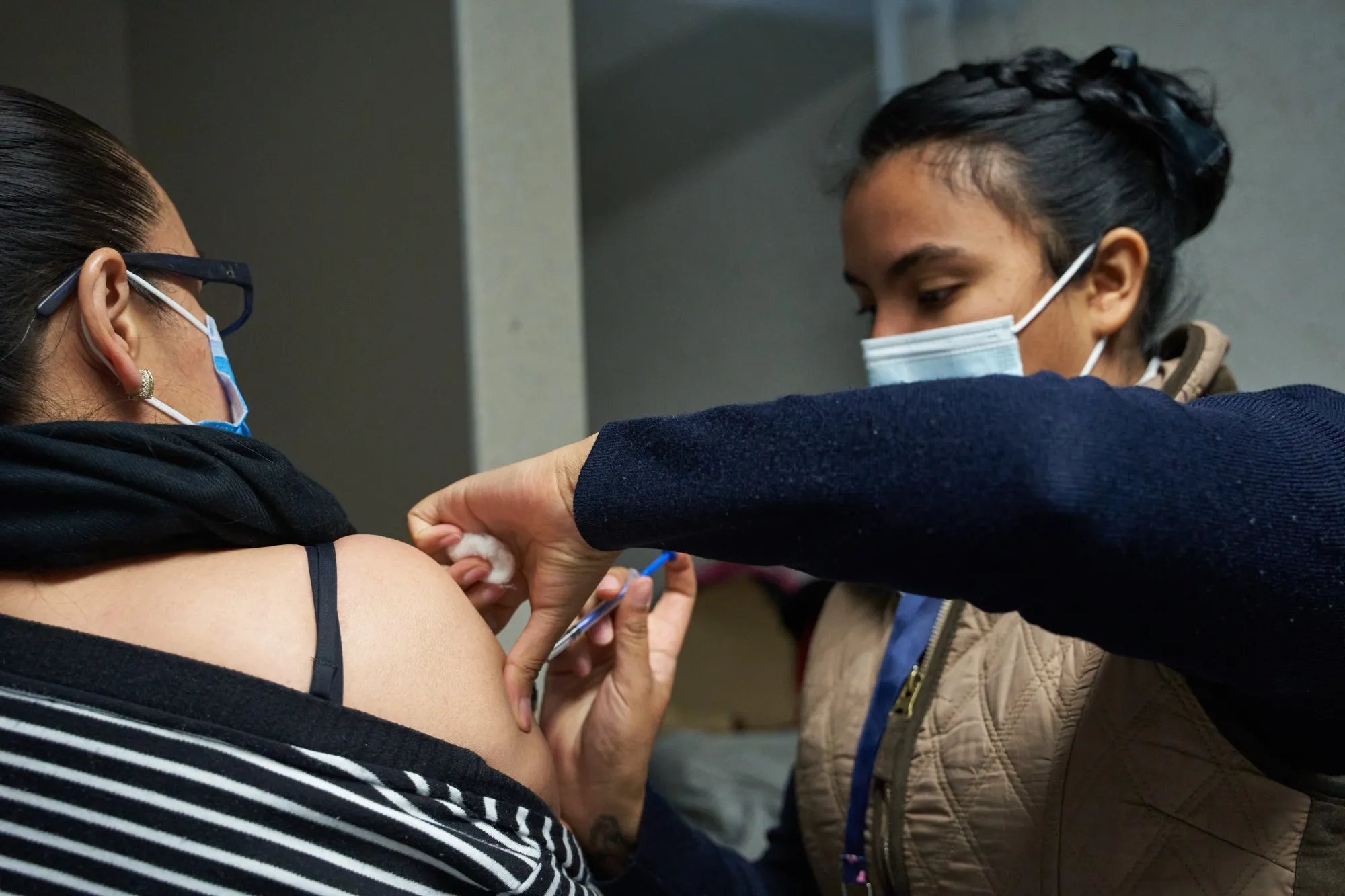 A healthcare worker administers a dose of the Pfizer BioNtech Covid-19 vaccine at the Centenario Hospital Miguel Hidalgo in Aguascalientes, Mexico on&nbsp;Jan. 14.