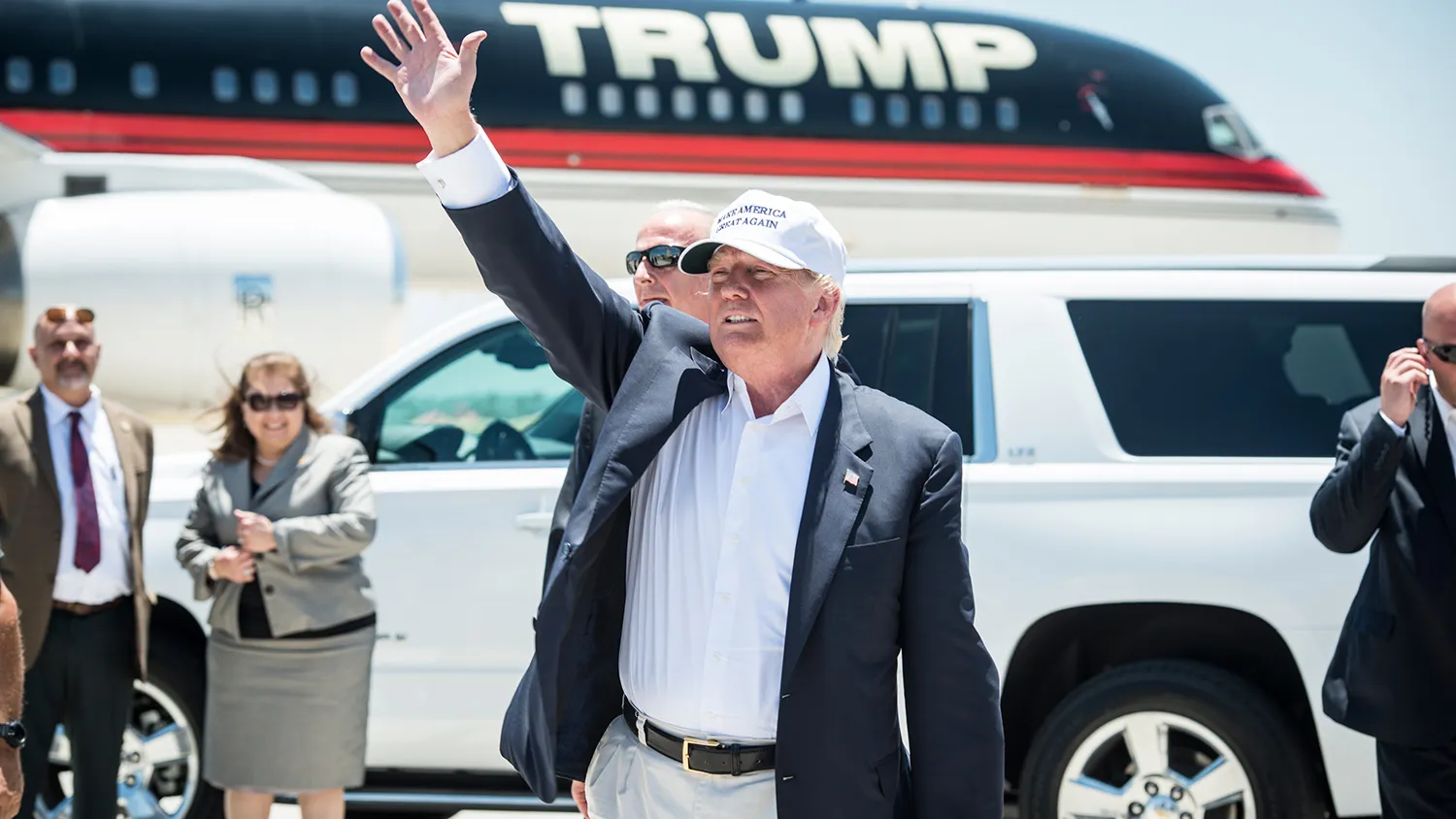 Republican presidential candidate Donald Trump exits his plane during his trip to the border on July 23, 2015, in Laredo, Texas.
